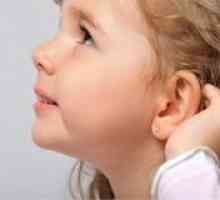 Unde și când este mai bine să străpunge urechile unui copil?